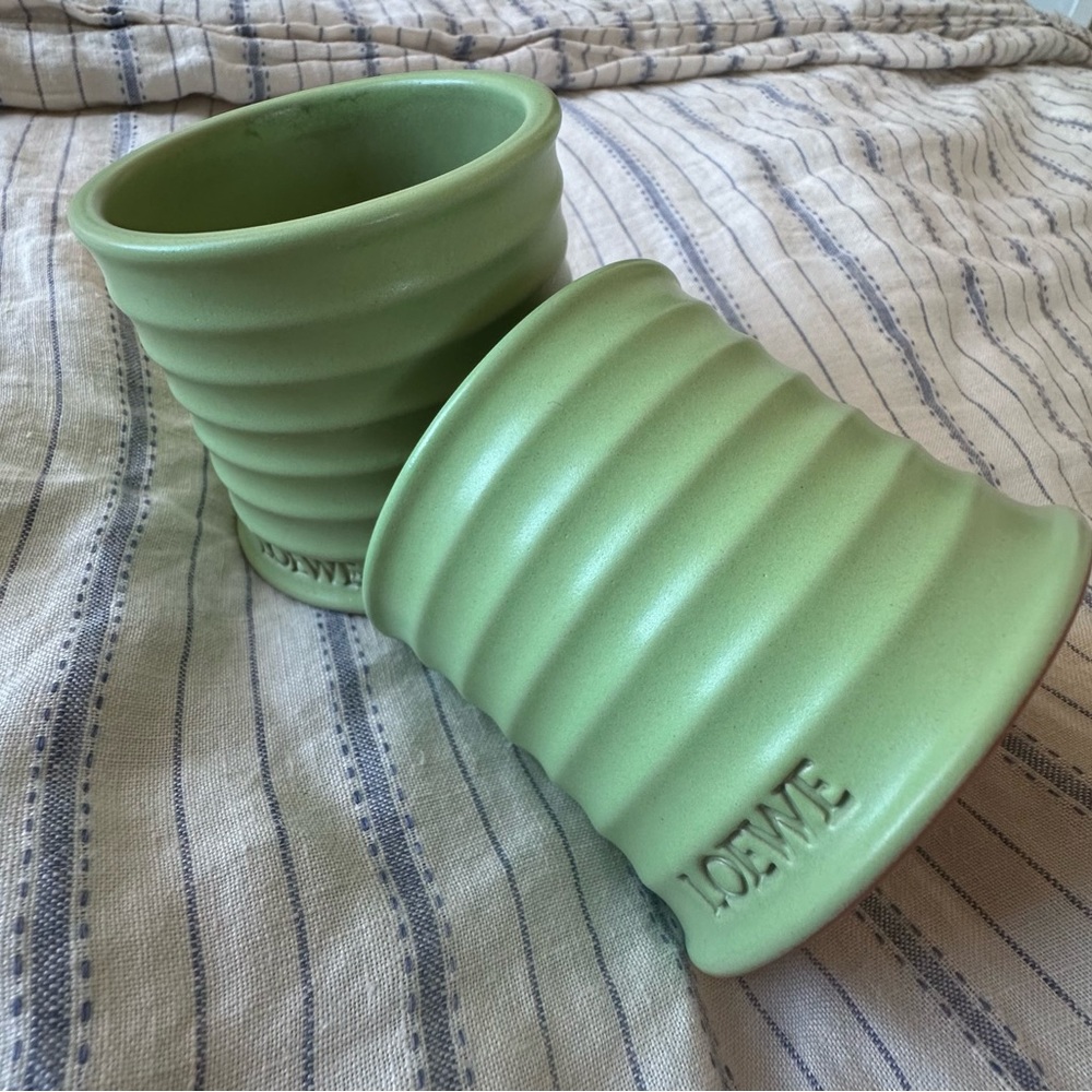 Two EMPTY Loewe candles